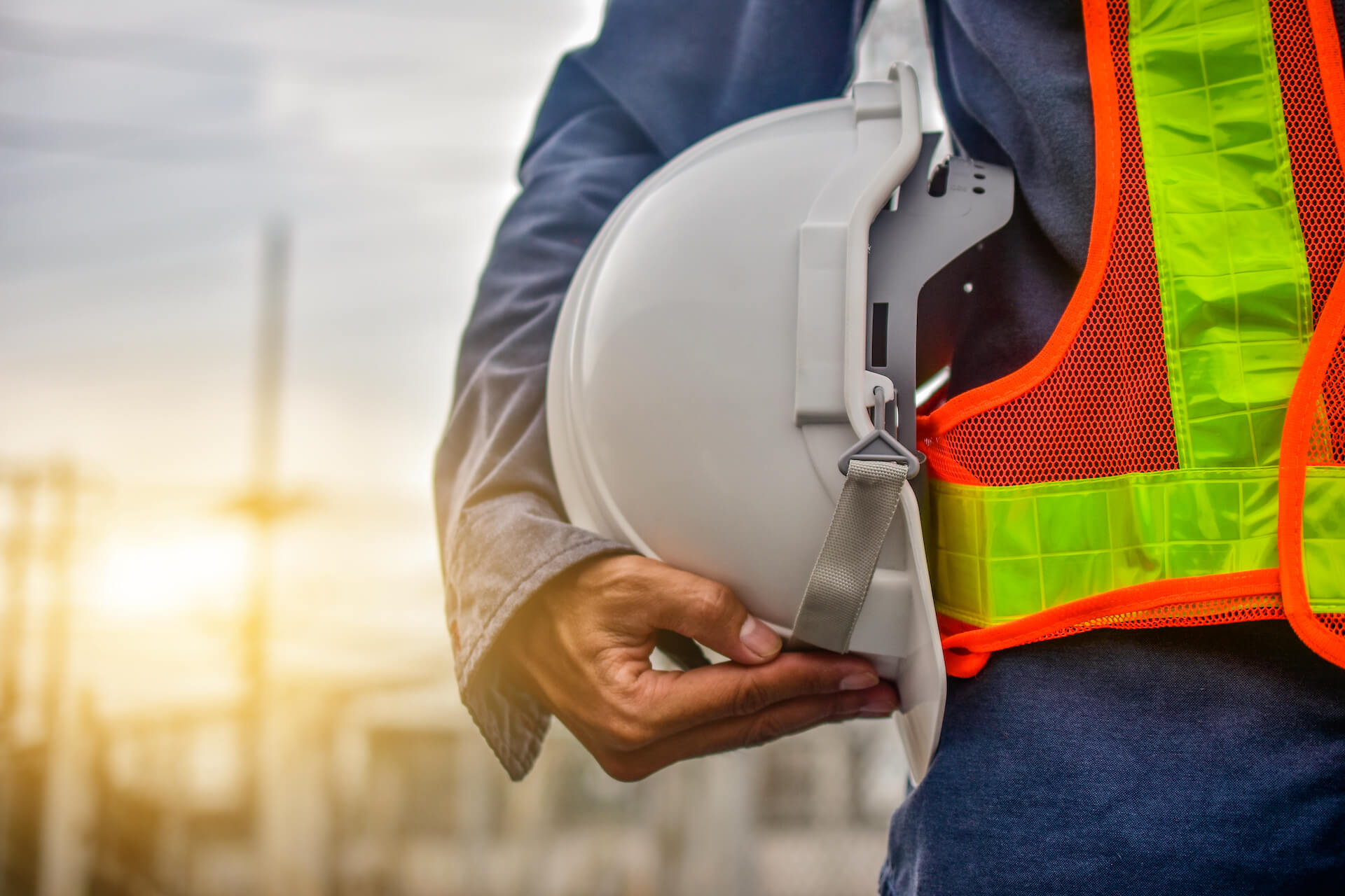 Construction worker wearing a hard hat on site